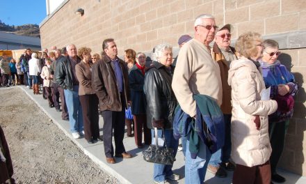 Large crowds turn out as rebuilt high school rises from the ashes after fire