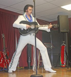 Adam Fitzpatrick from Penticton had the ladies swooning and the men singing along as he paid a return visit to the Osoyoos Seniors Centre this past Saturday evening. Fitzpatrick is one of the world’s most popular Elvis Presley impersonators as he finished second at the 2013 Elvis festival in Las Vegas last summer. More than 130 tickets sold out quickly as Fitzpatrick performed songs from throughout Presley’s remarkable career. (Keith Lacey photo) 