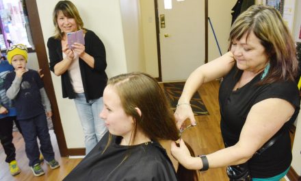 Woman donates locks for cancer patients
