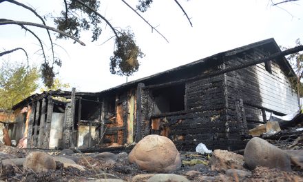 Fire burns Main Street home