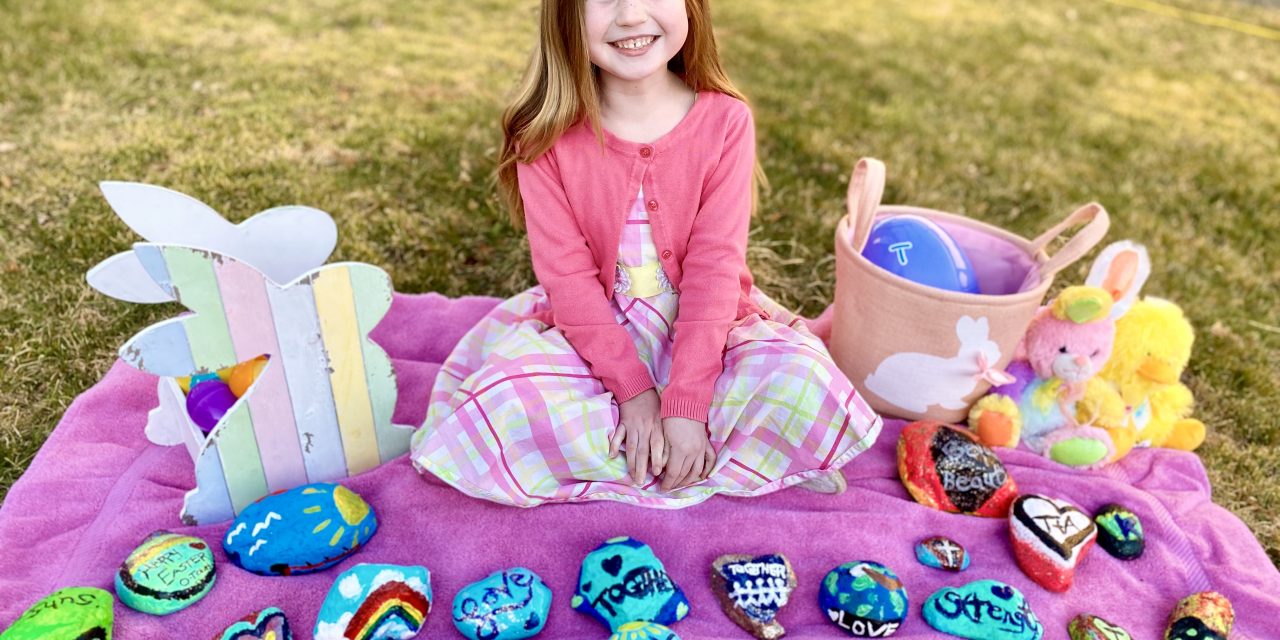 Mother and daughter make rock hunt for easter along Pioneer Walkway
