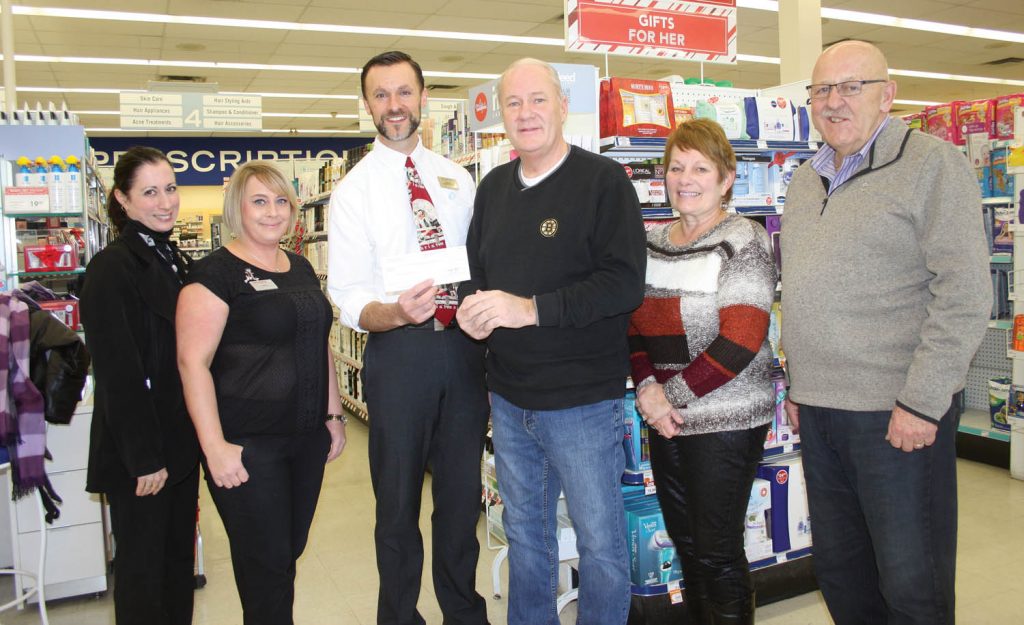 Management from the Osoyoos Shoppers Drug Mart recently presented a cheque for $5,992 to  board members with the Desert Valley Hospice Society (DVHS). The store sold icons as part of its support for the Growing Women’s Health program in September and October and donated the proceeds to DVHS. The money will be used entirely in Osoyoos to support local programs and services offered by DVHS. On hand for the cheque presentation were (from left) Shoppers sales associates Isabel Sociedade and Debbie Ross, Shoppers pharmacist/owner Steven Hopp and DVHS board members Ken Clarke, Delores Brisbois and Ted Cronmiller. (Keith Lacey photo)