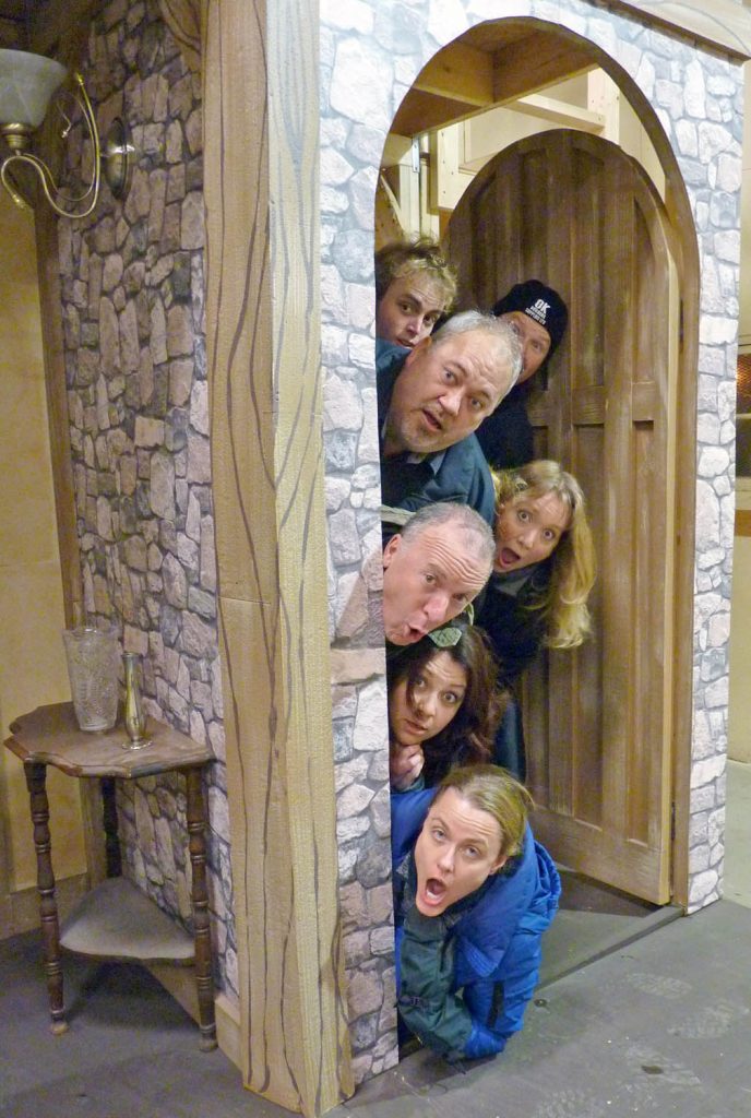 Pictured from top: Brohm Dason, Craig Bjornson, Nathan Linders, Penelope Johnson, Trevor Leigh, Jen Jensen, and Robin Stille collapse through the mill door in SOAP’s Noises Off. (Photo supplied)
