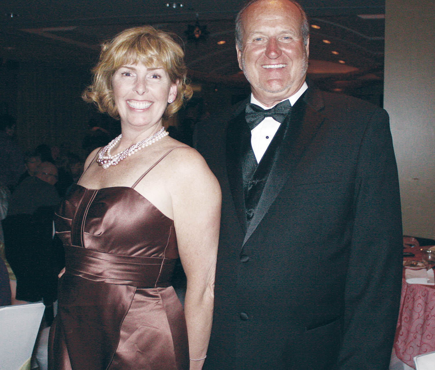 Town of Osoyoos Mayor Stu Wells and his wife Martha Collins were all smiles while posing for this picture at the 2013 Grand Night fundraiser for the Desert Sun Counselling and Resource Centre. The mayor and his wife will be in attendance for this year’s event, which is scheduled to take place on Saturday, Jan. 25 at the Watermark Beach Resort. Tickets for the event are now on sale and another sell-out crowd is expected to attend. (File photo Keith Lacey)