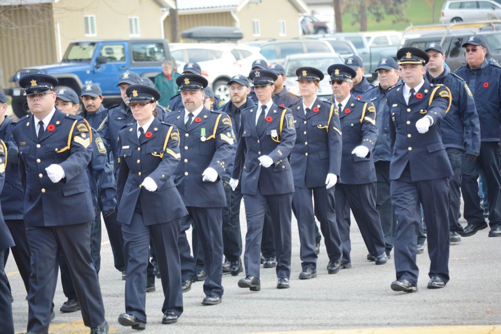 The fourth class of 24 corrections officers recently graduated from initial training at the Okanagan Correctional Centre in Oliver. Another class is set to graduate soon. Here, officers are shown marching during Remembrance Day ceremonies in Oliver. Inmates at the OCC are arriving this week. (Lyonel Doherty photo)