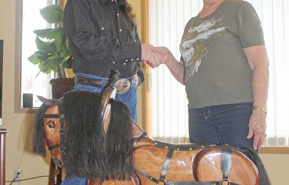 Osoyoos man wins wooden rocking horse from Soroptimists