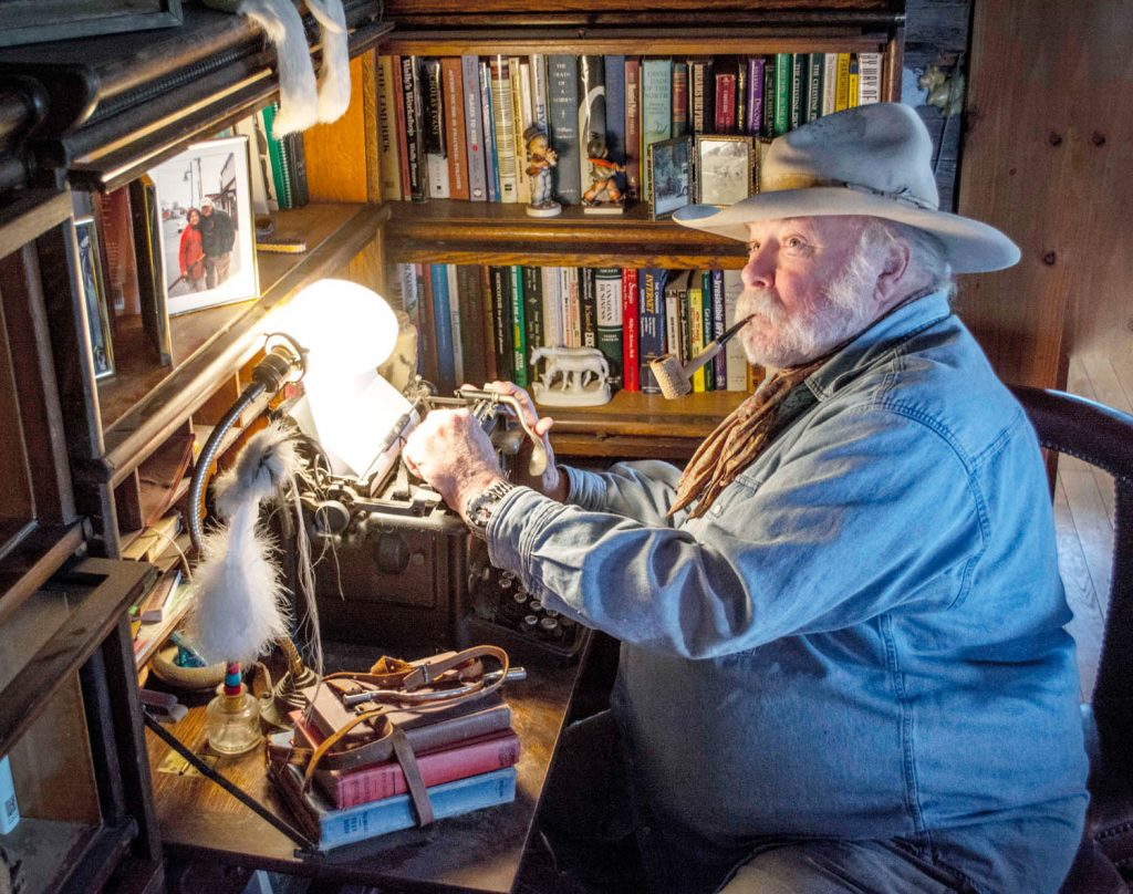 Bruce Fuller, who loves to write, pounds away at an antique typewriter as he ponders his future. (Dan Walton photo)