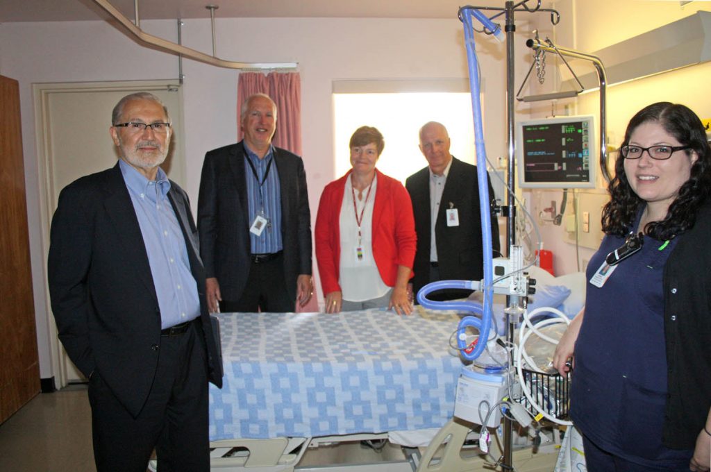 Senior administration with Interior Health paid a visit to the South Okanagan General Hospital in Oliver on Friday. Registered Nurse Lindsay Chandler showed them how to use a piece of equipment called an OptiFlow machines, which regulates the flow of oxygen for patients who need continuous access to oxygen. Looking on (from left) are Interior Health board chair Erwin Malzer, Peter Entwistle, SOGH’s Chief of Staff, Deb Junge, director of acute care services for the South Okanagan and CEO Chris Mazerkewich. (Keith Lacey photo)