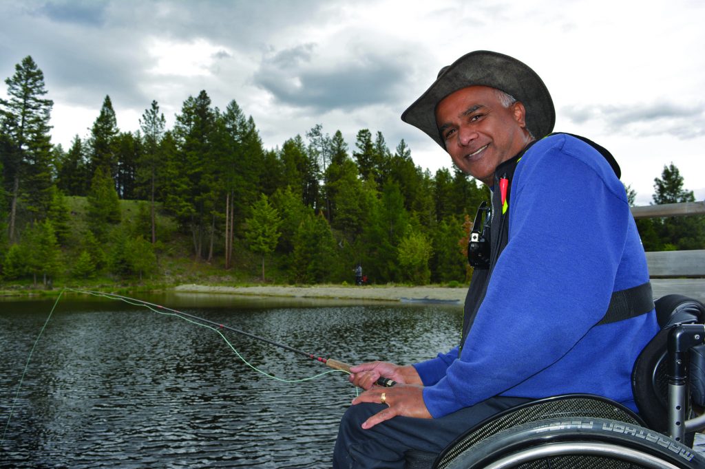 Anand Kanna from Kelowna made the trip from Kelowna this past weekend to participate in the Fishing Forever event that is sponsored by the BC Wildlife Federation. The event allows people in wheelchairs and those who suffer from other disabilities to get out and enjoy a wonderful day of fishing. The Strohmann family, who built a manmade lake on their property, have been active supporters of the event since it started in Osoyoos three years ago. (Dan Walton Photo).