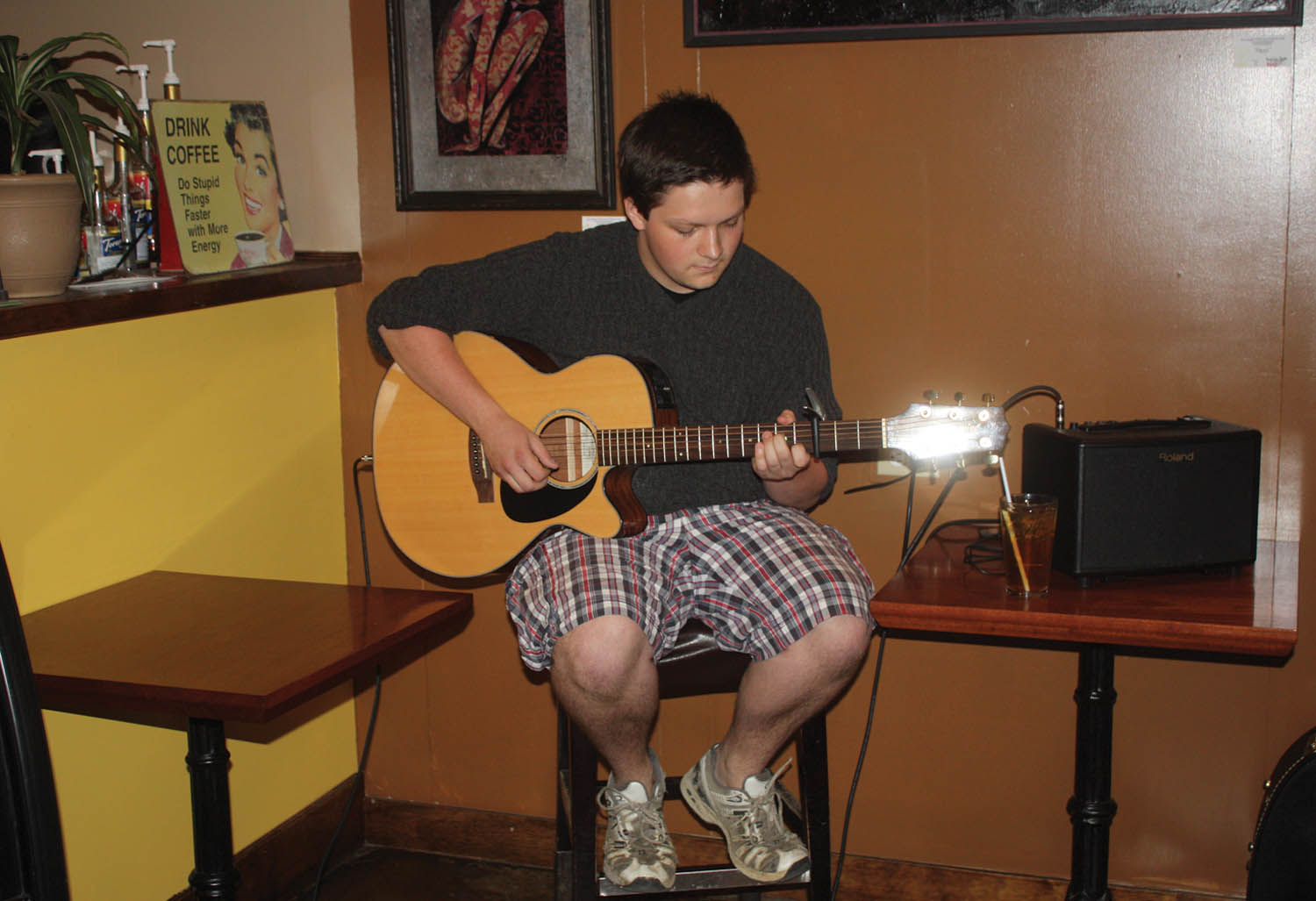 Jojo’s Cafe on Main Street in downtown Osoyoos held another event this past Saturday night to support local artists. Painter Kristine Lee displayed some of her art work, while musicians Kansas-Lee Hatherly and Christian Harfmann (above) played guitar and sang tunes to an appreciative audience. (Keith Lacey photo)