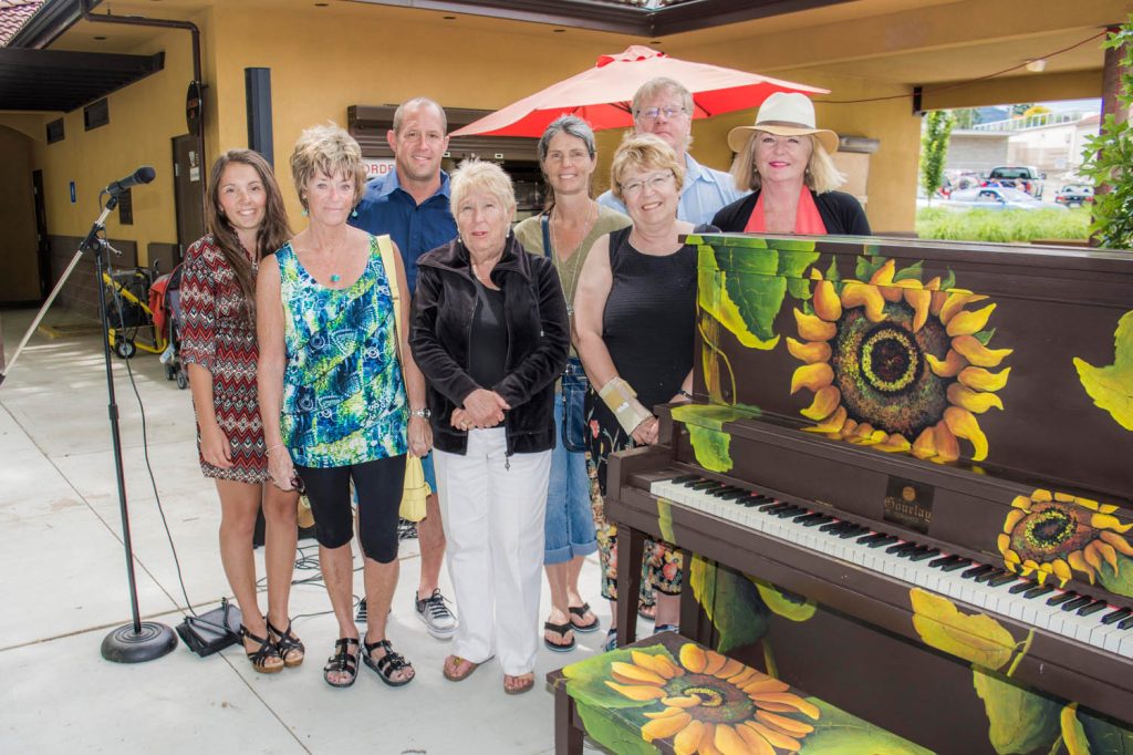 Kayla Turnbull, Sherri Bridden, Cory Lemenski, Sharon Leonard, Bonnie Turnbull, Vivan Calder, Marcel St. Louis and Janis St. Louis are among the donors and artists who brought together Piano in the Park. (Dan Walton photo)