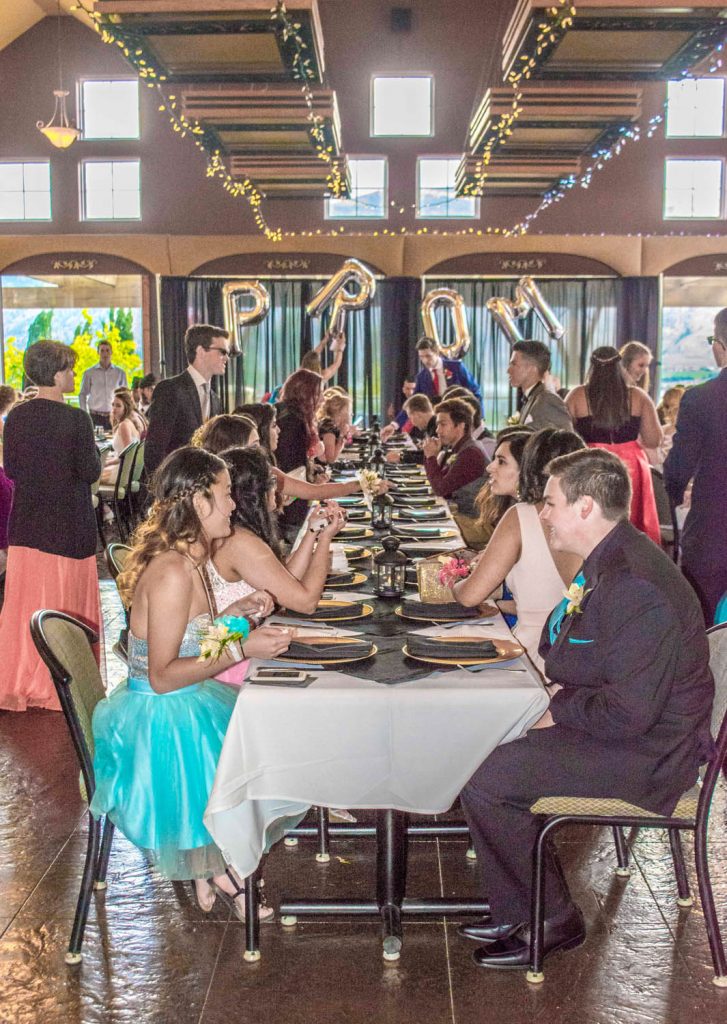 Students take their places at the table at Osoyoos Secondary School's Prom 2016. (Dan Walton photo)