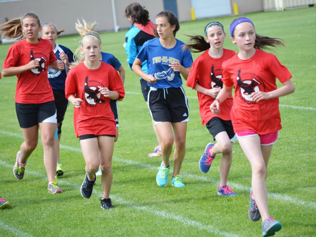 Girls from Osoyoos Elementary School compete in the junior marathon at last Friday’s district track meet in Oliver. Students from several local elementary schools participated in this event. (Lyonel Doherty photo)