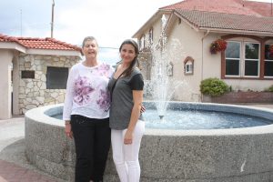 Former Osoyoos Elementary School teacher and longtime local orchard owner Joan Collins says she has been too busy undergoing treatment to feel sorry for herself since being diagnosed with breast cancer 14 months ago. Collins, seen here with her granddaughter Paige, is looking forward to participating in the Canadian Cancer Society’s annual Relay for Life on Saturday in Gyro Park in Osoyoos. Photo by Keith Lacey.
