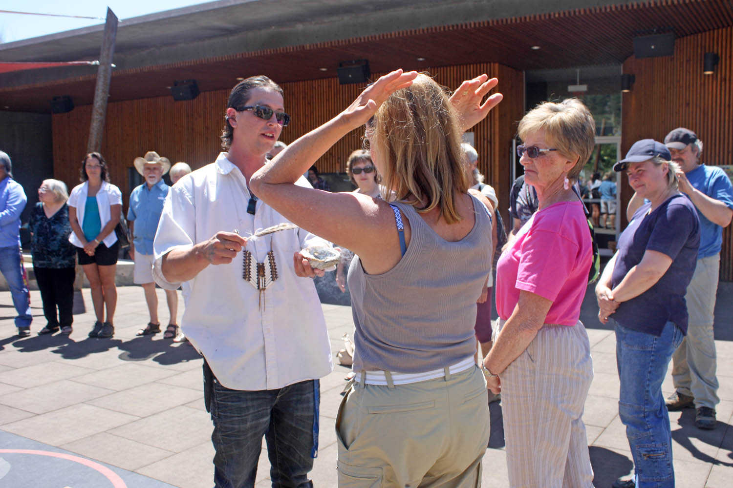 The Nk’ Mip Desert Cultural Centre held a full day of events to celebrate National Aboriginal Day in Canada this past Saturday, which also marked the first day of summer. Close to 30 local residents and visitors took part in the festivities. The schedule of events included an opening prayer and First Nations smudge, which was led by Osoyoos Indian Band member and interpreter Kxansulaxw Hall. This was followed by the serving of traditional bannock and refreshments and a guided walk to the village. Participants also viewed the acclaimed film Coyote Spirit. Marketing manager Derek Bryson spent some time thanking all of the participants for visiting the centre and taking part in Aboriginal Day celebrations. (Keith Lacey photo)
