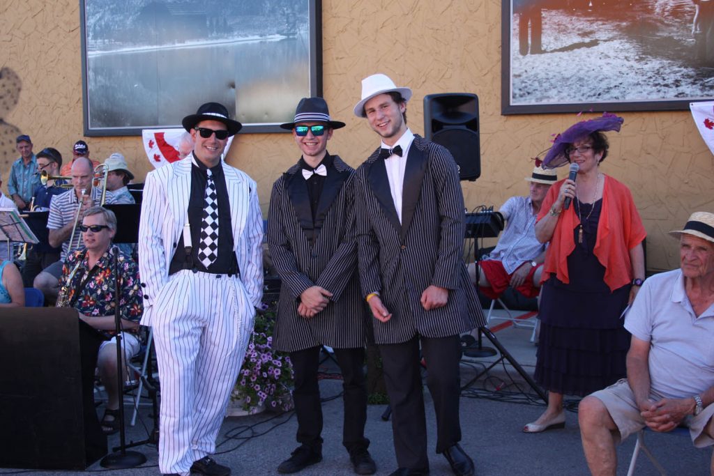 There were costumes from the past at a ceremony Sunday to dedicate new photo murals on the east outside wall of Osoyoos Home Hardware. These gents were the best dressed. (Keith Lacey photo)