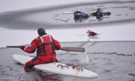 Boy saved after falling through thin ice on lake