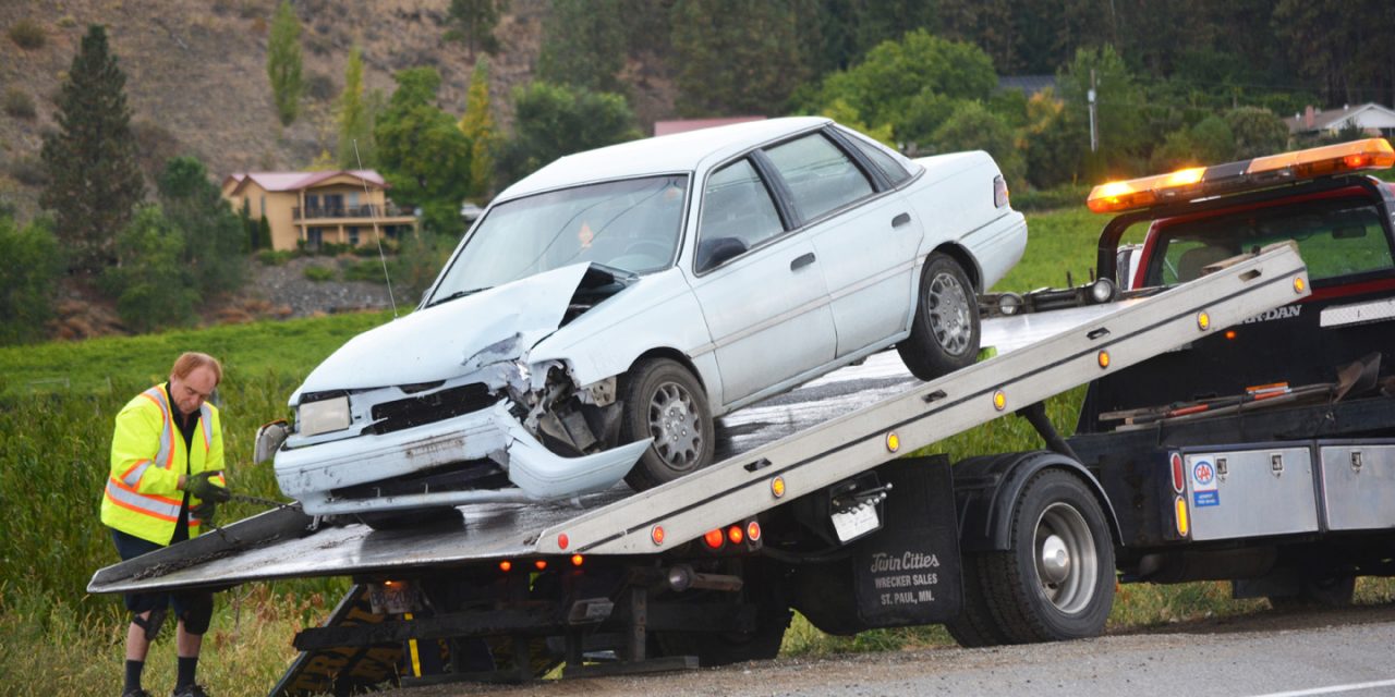 Vehicle strikes power pole on Highway 97