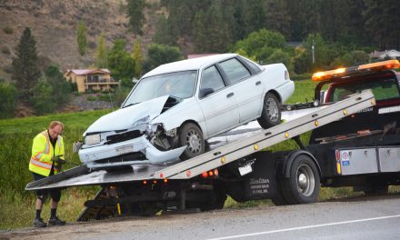 Vehicle strikes power pole on Highway 97