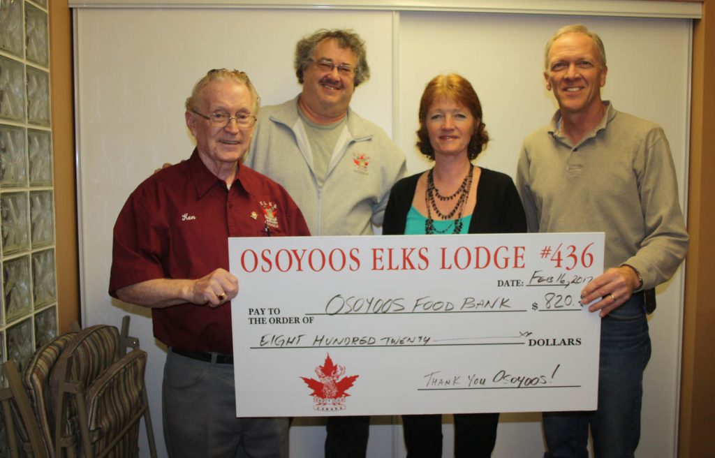 A concert at the Osoyoos Elks Lodge featuring father-daughter Ken  Charles (far left) and Cindy Doucette raised $820 for the Osoyoos Food Bank. Also on hand for the presentation were Elks president Ken Thibault and Pastor Phil Johnson from Osoyoos Baptist Church. (Keith Lacey photo)
