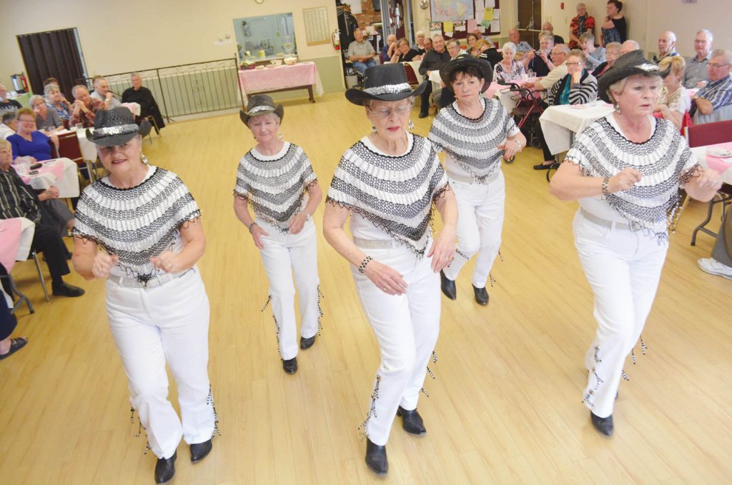 The Bordertown Boot Scooters put on a great show at the Osoyoos Senior’s Centre on Sunday during the centre’s annual tribute to the large number of snowbirds who flock to Osoyoos every winter. Shown line dancing are (from left) Terry Ford, Brigitte Hawes, Claudia Sauder, Rosa Tortora and Jeri Falk. (Lyonel Doherty photo)
