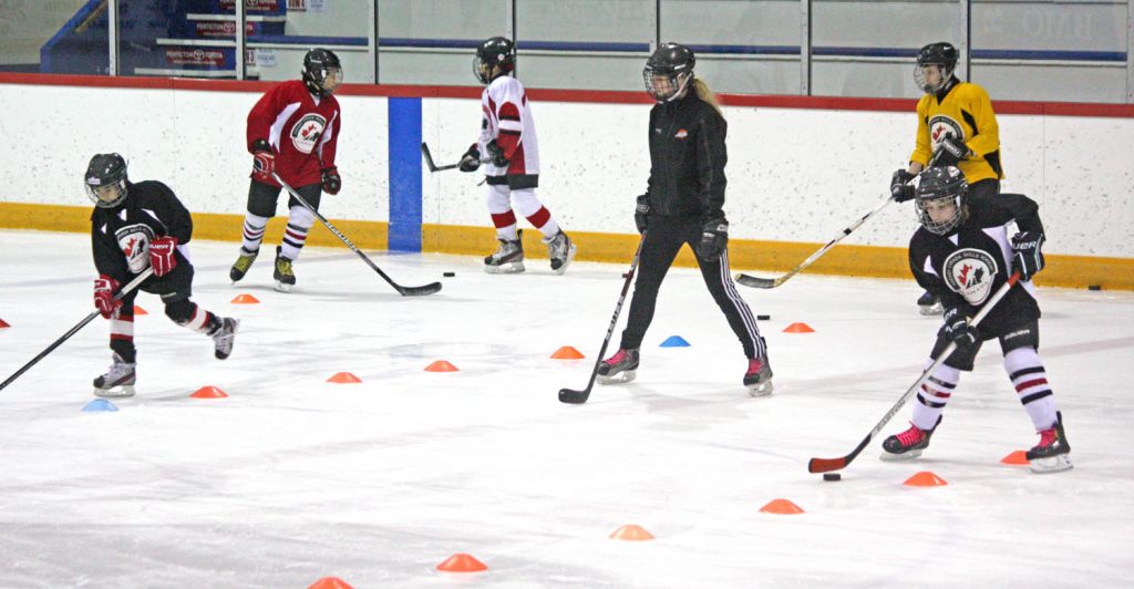 Close to 40 players involved in the hockey academy at Osoyoos Elementary School were on the ice last Friday when top brass from Hockey Canada and BC Hockey visited town to find out how the program is run and why it has become such a huge success. (Keith Lacey photo)