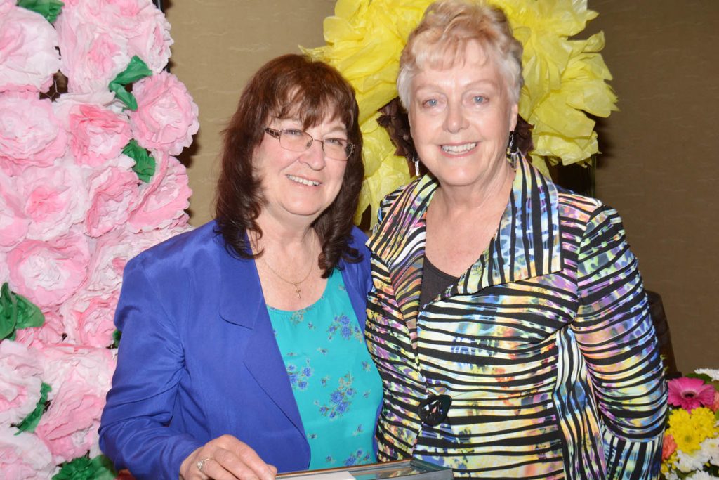 Osoyoos Mayor and Osoyoos Soroptimist International president Sue McKortoff teared up when describing all of the wonderful community work Janet Marcotte (left) has accomplished during her many years in Osoyoos. Marcotte was given the Woman of Distinction honour. (Lyonel Doherty photo)