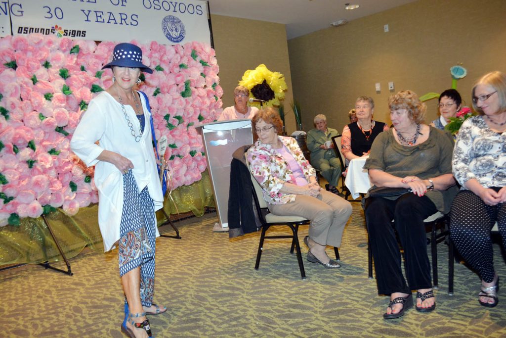 Valerie Hoppe, owner of Valanné Style shows off some fashions at the Osoyoos Soroptimist fashion show at the Watermark Beach Resort. (Lyonel Doherty photo)