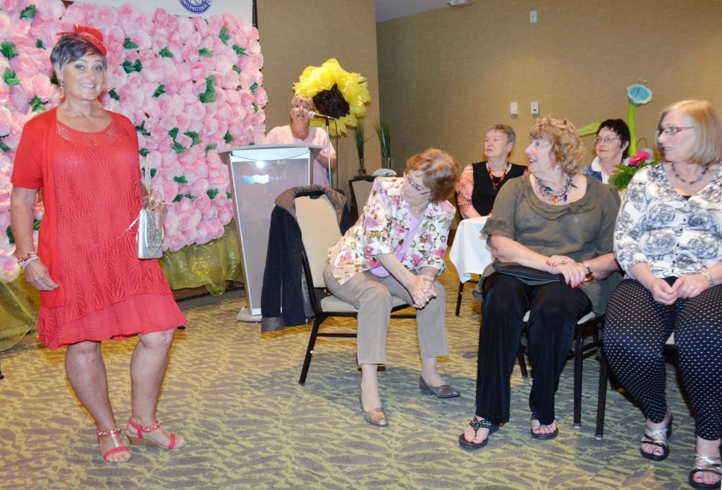 Wendy Mellace from Valanne Style shows off a striking red outfit during the Osoyoos Soroptimist fashion show at Watermark Beach Resort on May 6. (Lyonel Doherty photo)