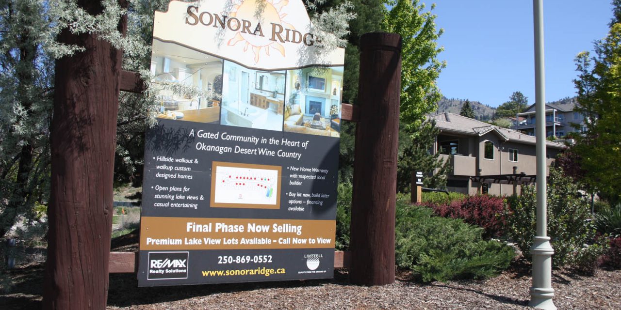 Real estate developers upset town bylaw officers have torn down signs