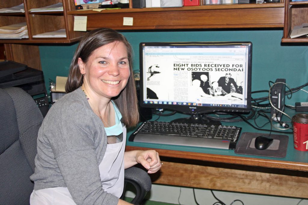 Kara Burton, executive director of the Osoyoos Museum, researched the controversy surrounding the decision to build Osoyoos Secondary School. The tension and hostility on school board suggest history has repeated itself. (Keith Lacey photo)