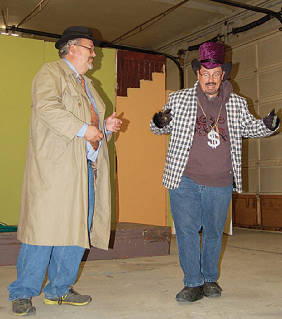 Nathan Linders (left) and David Badger (right) of the South Okanagan Amateur Players (SOAP) rehearse a scene from the group’s production of ‘Twisted Tales’ in 2013. SOAP will perform ‘Sleeping Indoors’ at the upcoming 2016 Okanagan Zone Theatre Festival. The one week festival commences May 21 and will feature seven productions between May 21-28 at the Frank Venables Theatre in Oliver. (Erin Christie photo)