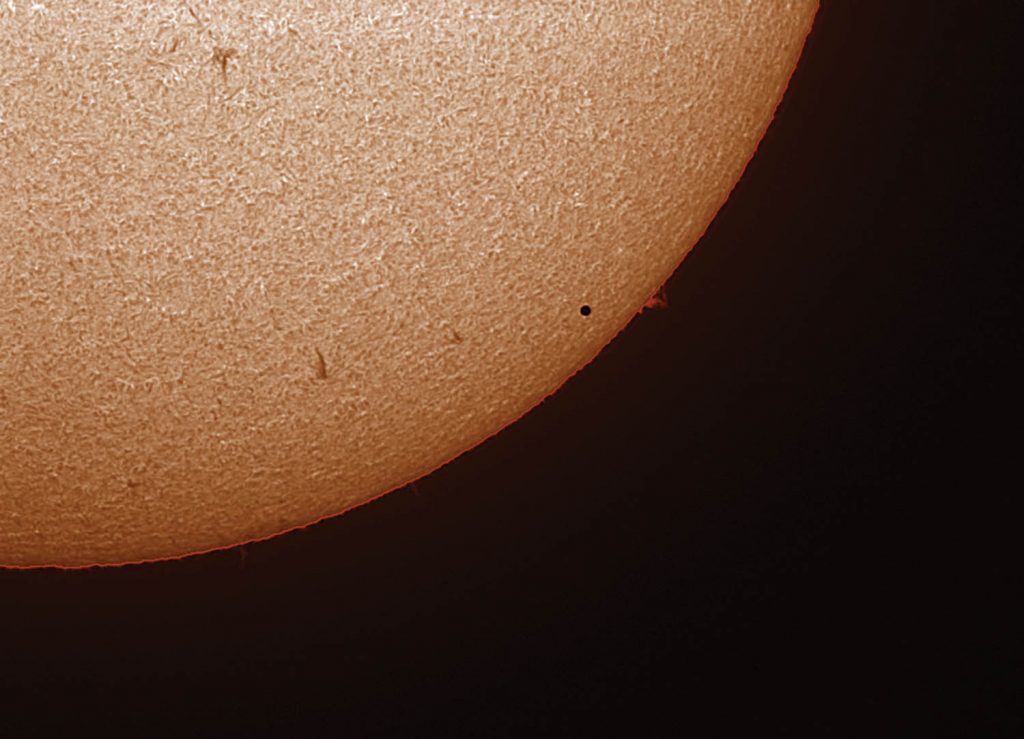 Local astronomy expert and award-winning photographer Jack Newton took this incredible photograph of the planet Mercury passing by the Sun this past weekend in a rare astronomical event called Mercury in Transit. Mercury is the tiny black dot seen at the bottom right of the sun in this photo. (Jack Newton photo)