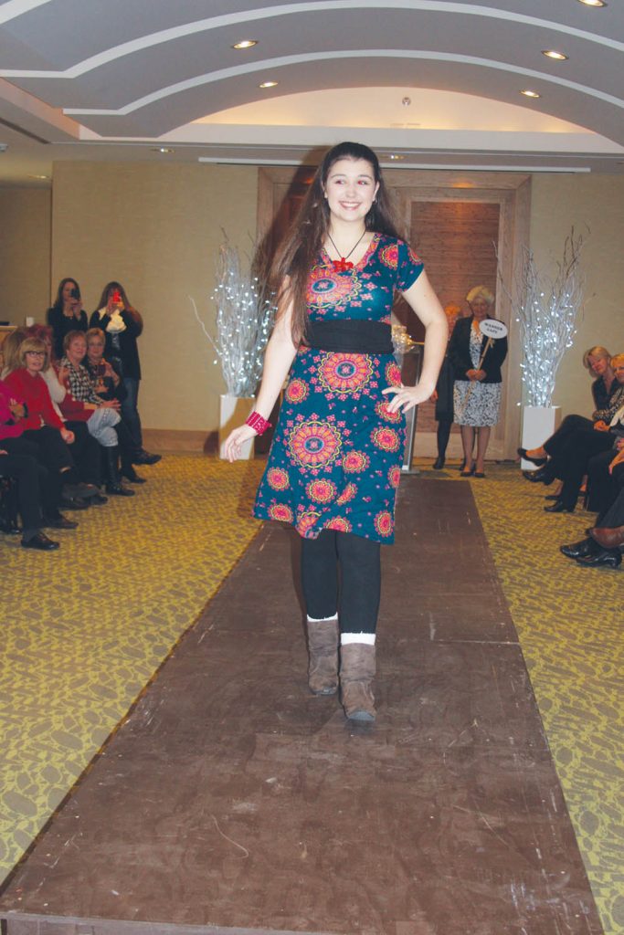ianna Morgan shows off a colourful new dress during the Osoyoos Soroptimist Club’s fundraising fashion show on Saturday. (Keith Lacey photo)