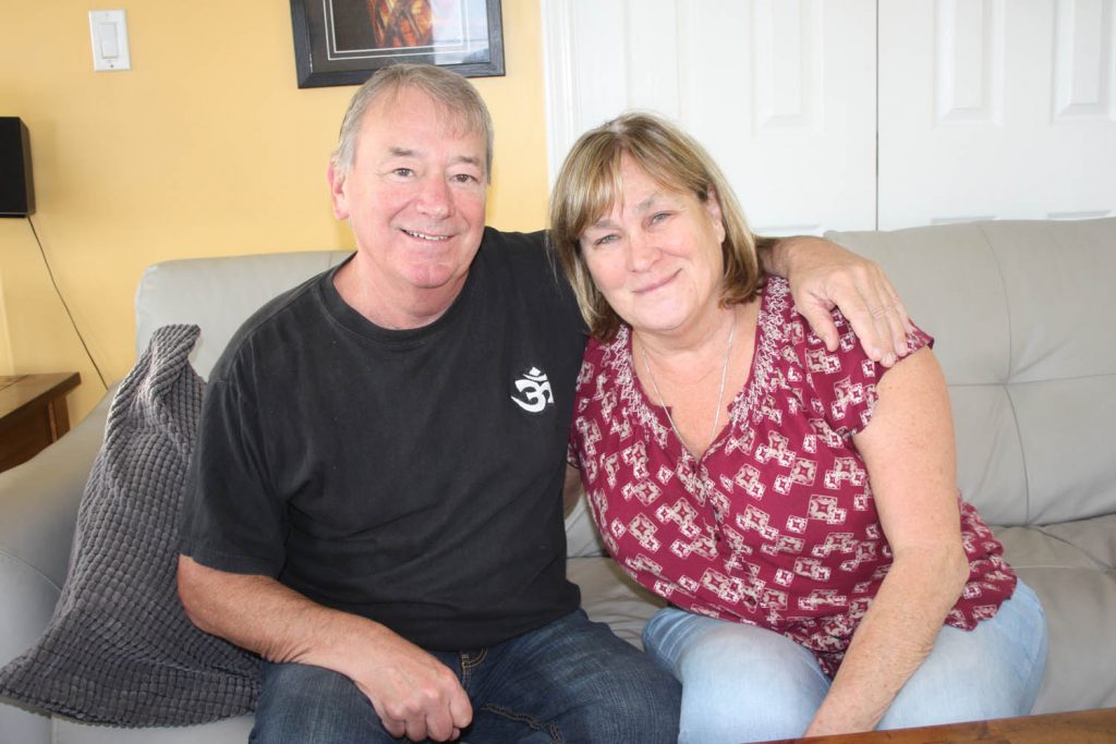 Osoyoos couple Ron Stuart and Barb Chipperfield have spent much of their 13 years together travelling the world. They will be leaving in a couple of weeks to travel to Cambodia, where they will help at a school in the southeast Asian country. Stuart will use his carpentry skills, while his wife will teach English to the young students. The happy couple plan on travelling across other parts of Asia once they spend a couple of weeks helping out in Cambodia. They are accepting donations of school supplies and small toys before they leave on their trip on Dec. 16. (Keith Lacey photo)
