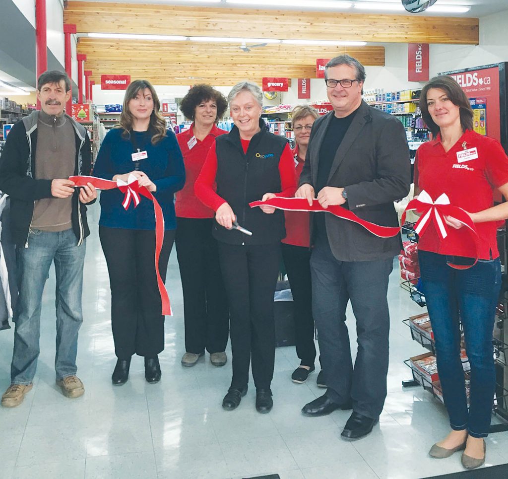 The new Fields department store on Main Street in Osoyoos held its official grand opening Friday morning. On hand for the official ribbon cutting (from left) were landlord Alex Nunes, district manager Marika Kokoshke, sales associate Gina Hamilton, Mayor Sue McKortoff, sales associate Robin Martens, president Dean Petruk and market leader Jennifer Benson. (Photo supplied)