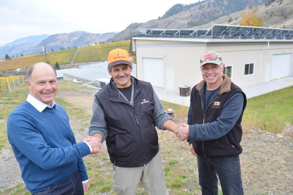 A special open house was held at Gehringer Brothers Estate Winery last Saturday to show the public the new bi-facial solar roof that the winery installed recently. Shown from left are Walter Gehringer, Roger Huber, CEO of Swiss Solar Tech Ltd., and Gordon Gehringer. (Lyonel Doherty photo)