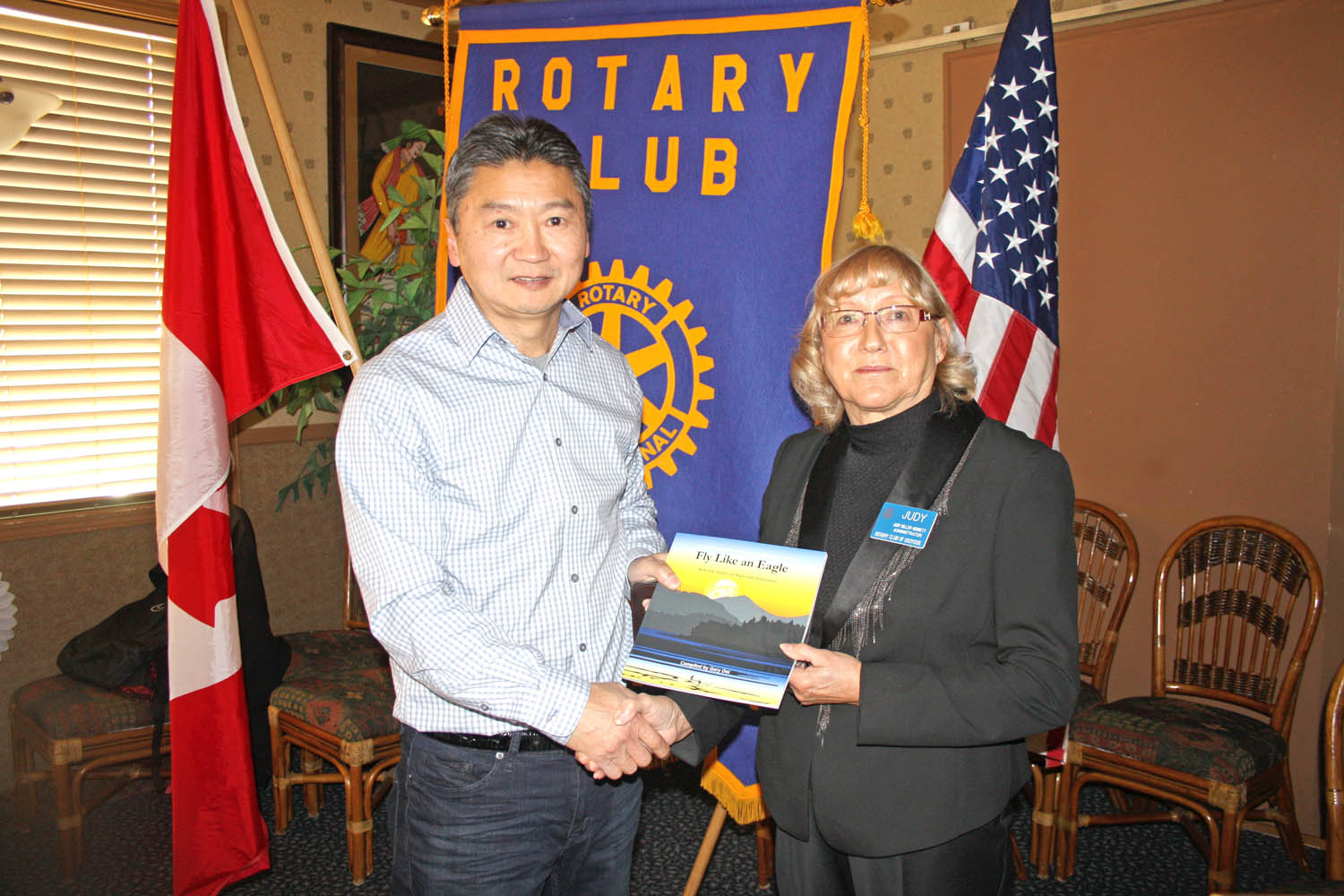 Gary Doi, a retired school board superintendent from Penticton and longtime teacher, was the special guest of the Osoyoos Rotary Club recently. Doi spoke about his magazine blog and two books he helped publish, which are all designed to share stories of hope from across Canada and around the world. He is shown with Osoyoos Rotary Club president Judy Miller Bennett. (Keith Lacey photo)