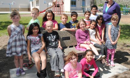 New bench at Oliver Elementary School honours late Principal Barton Tumlinson