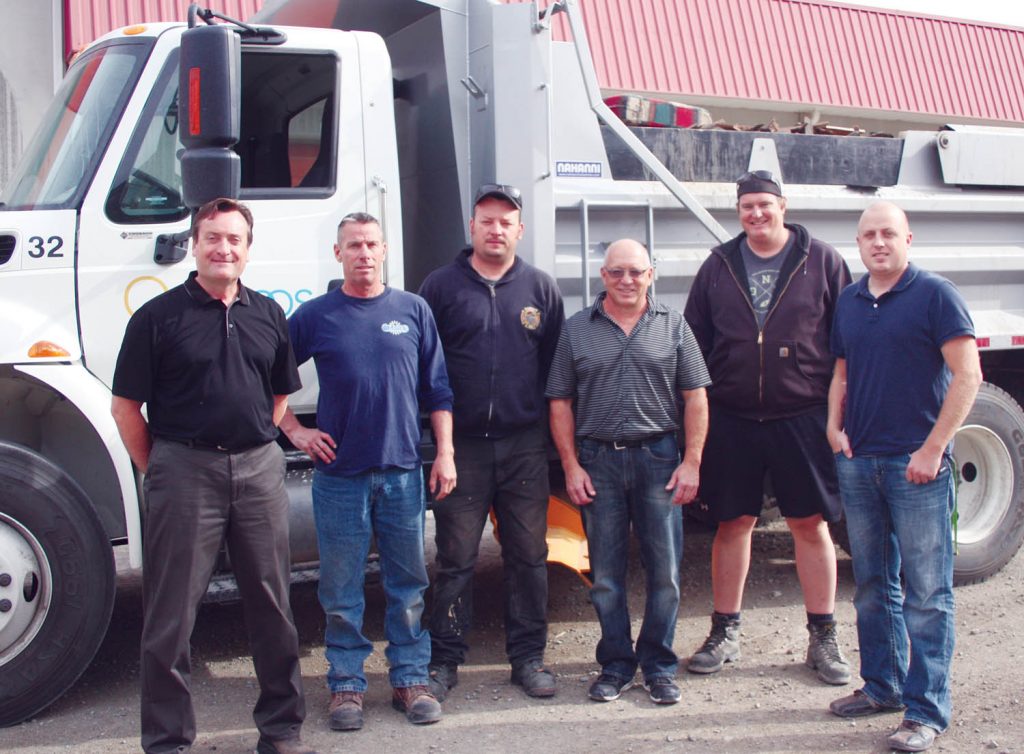 After 23 years on the job as the Director of Operational Services and a 40-year career, Ron Doucette (fourth from left) said goodbye to his many co-workers with the Town of Osoyoos last Friday afternoon. Doucette, an extremely popular boss, plans on playing a lot of golf and hockey now that he’s retired. Saying goodbye were (from left) incoming Director of Operational Services Jim Dinwoodie, public works foreman and good friend Mike Thomas, Karl Fichter, Leigh Lougheed and Casey Brouwer. (Keith Lacey photo)