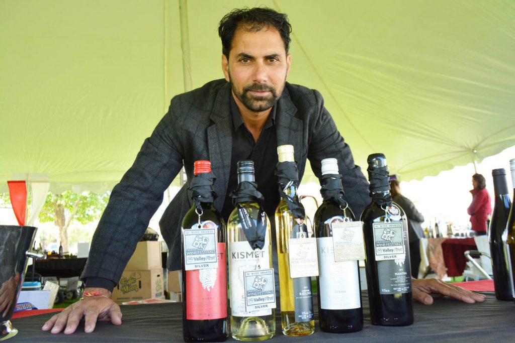 Balwinder Dhaliwal of Kismet Estate Winery shows his award-winning wines as one of 55 wineries at Festival of the Grape. (Lyonel Doherty photo)