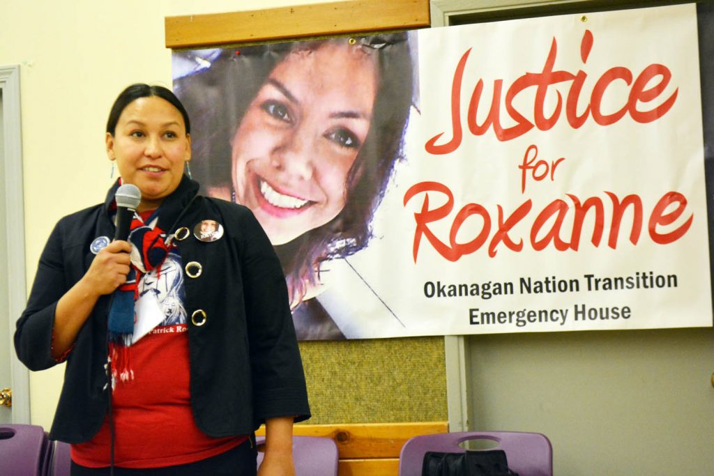 Coola Louis, women’s representative for the Union of BC Indian Chiefs, addresses the Sisters in Spirit Vigil at the Osoyoos Indian Band community hall on Sunday, Oct. 4. Louis is calling for a national inquiry into missing and murdered indigenous women. The poster depicts Roxanne Louie, a single mother who was murdered earlier this year. Louie was a member of the Osoyoos Indian Band. (Lyonel Doherty photo)
