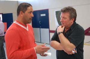 Paul Gill from Paul's Greenhouses in Osoyoos talks to Jeff Wiseman (right) from the Ministry of Transportation. Gill is one of many  business owners raising concerns about the regional district's crackdown on signage along Highway 97. (Lyonel Doherty photo)
