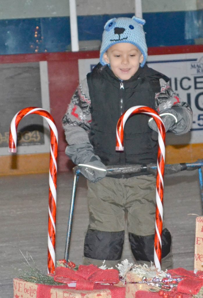 Milan Matyas might be considering taking a bite of the Christmas display. (Trevor Nichols photo)