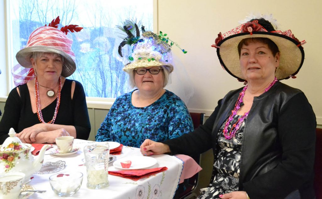 Sue Reed, Debra Hupp and Velda Field came dressed for the occasion at the Osoyoos Senior Centre’s Valentine’s Day High Tea on Feb. 14. (Trevor Nichols photo)