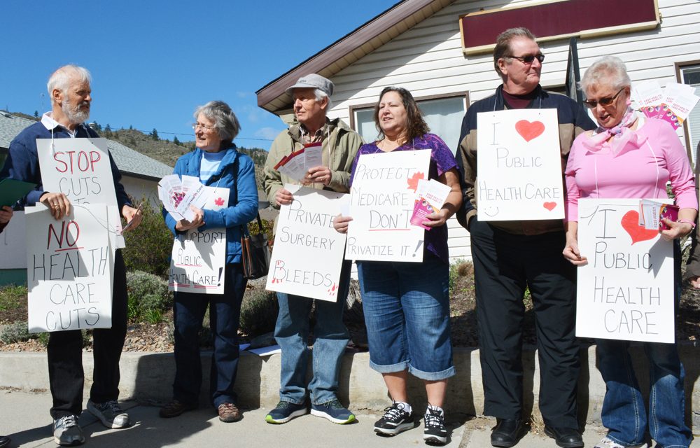 People rally against health care cuts