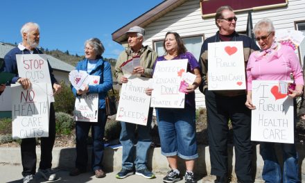 People rally against health care cuts