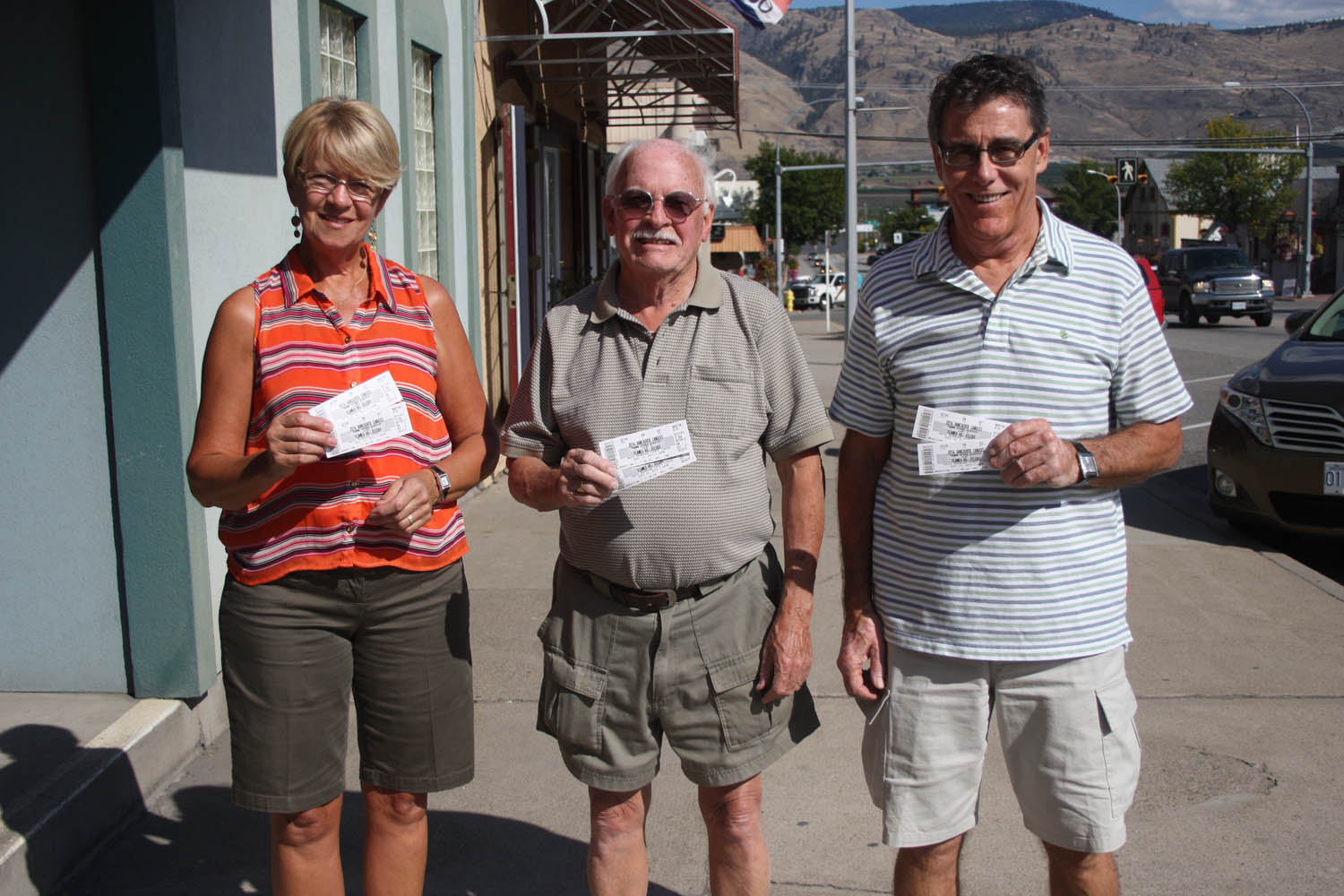 These three lucky hockey fans will be in Penticton at the South Okanagan Events Centre on Saturday afternoon after each winning a pair of tickets to watch the top prospects from Calgary Flames and Edmonton Oilers battle each other in the Young Stars tournament. Prospects from the Vancouver Canucks and Winnipeg Jets are also participating in the event, which runs from Thursday, Sept. 12 until Monday, Sept. 15. The Osoyoos Times sponsored the contest. Winning a pair of tickets each were (from left) Geraldine Goosen, Bryant Sole and Garry Sutton, all from Osoyoos. (Keith Lacey photo)