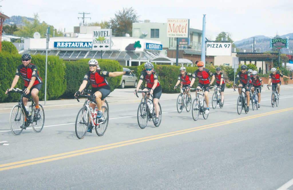 More than a dozen RCMP officers and support staff rode their bikes from Penticton to Oliver Saturday morning as part of the annual Cops for Kids event, which has helped raise in excess of $4 million over the past 15 years to assist children in crisis across the Okanagan Valley. The riders were treated to a luncheon at the Oliver Fire Department hall in Oliver before heading up to meet a second team of riders in Grand Forks on Saturday evening. The ride ends on Sunday in Kelowna. (Keith Lacey photo)