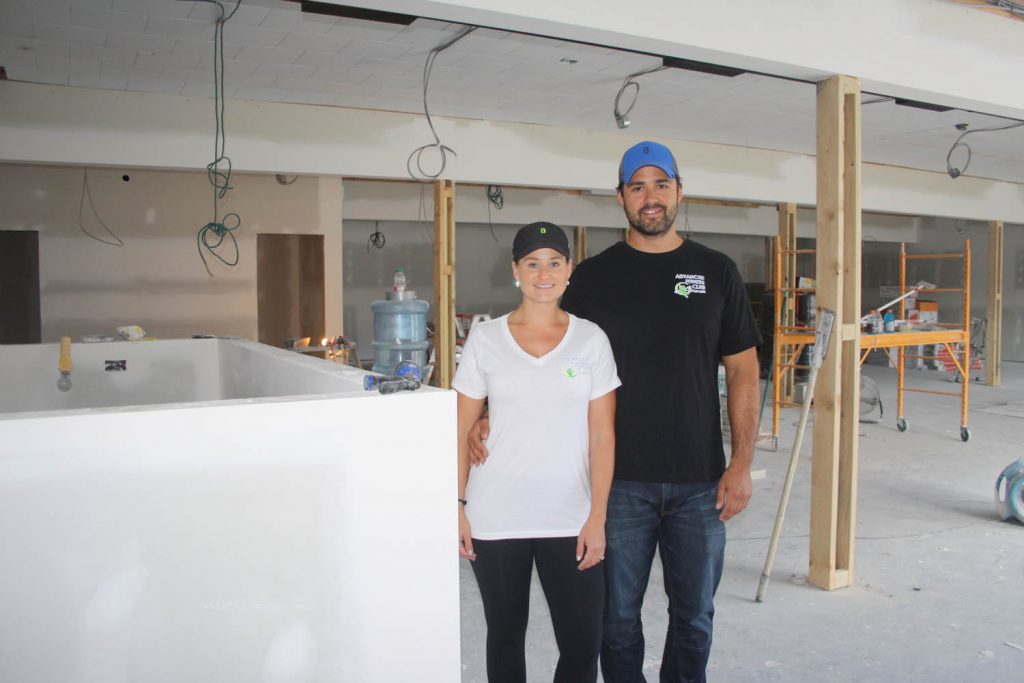 Matt and Kate Shull are the proud new owners of the Advanced Fitness Centre, which is scheduled to open to the public during the second week in October. The Shulls have purchased the older Sears retail outlet building on 85th Street and have been working with a renovation crew to turn the 4,300 square foot space into a modern gymnasium and fitness centre. The couple, who have three young children, say they have dreamed of owning their own fitness facility for many years. (Keith Lacey photo)